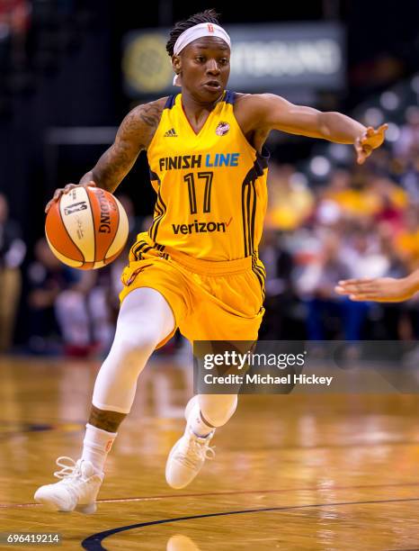 Erica Wheeler of the Indiana Fever drives to the basket during the game against the Atlanta Dream at Bankers Life Fieldhouse on June 15, 2017 in...