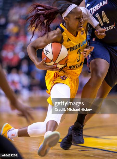 Tiffany Mitchell of the Indiana Fever drives to the basket during the game against the Atlanta Dream at Bankers Life Fieldhouse on June 15, 2017 in...