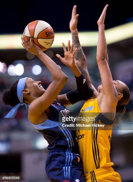Brittney Sykes of the Atlanta Dream shoots the ball against Jazmon Gwathmey of the Indiana Fever at Bankers Life Fieldhouse on June 15, 2017 in...