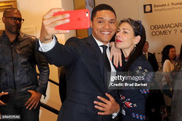 Trevor Noah and Stacy London attends the Donald J. Trump Presidential Twitter Library Opening Reception presented by Comedy Centrals The Daily Show...