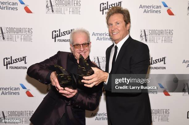 Inductees James Pankow and Robert Lamm pose with their awards backstage at the Songwriters Hall Of Fame 48th Annual Induction and Awards at New York...