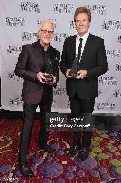 Inductees James Pankow and Robert Lamm pose with their awards backstage at the Songwriters Hall Of Fame 48th Annual Induction and Awards at New York...