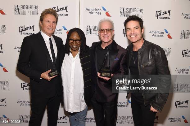Inductees Robert Lamm and James Pankow , pose with Whoopi Goldberg and Pat Monahan backstage at the Songwriters Hall Of Fame 48th Annual Induction...