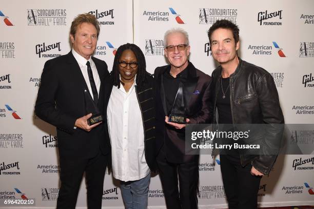 Inductees Robert Lamm and James Pankow , pose with Whoopi Goldberg and Pat Monahan backstage at the Songwriters Hall Of Fame 48th Annual Induction...