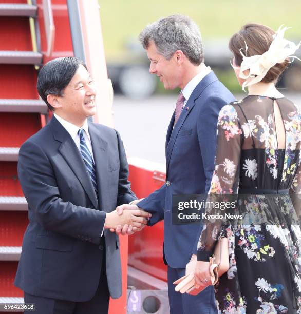 Japan's Crown Prince Naruhito is welcomed by Denmark's Crown Prince Frederik and Crown Princess Mary after arriving in Copenhagen on June 15 for a...