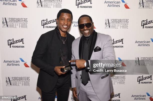 Inductee Kenneth "Babyface" Edmonds and Johnny Gil pose backstage at the Songwriters Hall Of Fame 48th Annual Induction and Awards at New York...