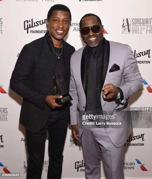 Inductee Kenneth "Babyface" Edmonds and Johnny Gil pose backstage at the Songwriters Hall Of Fame 48th Annual Induction and Awards at New York...