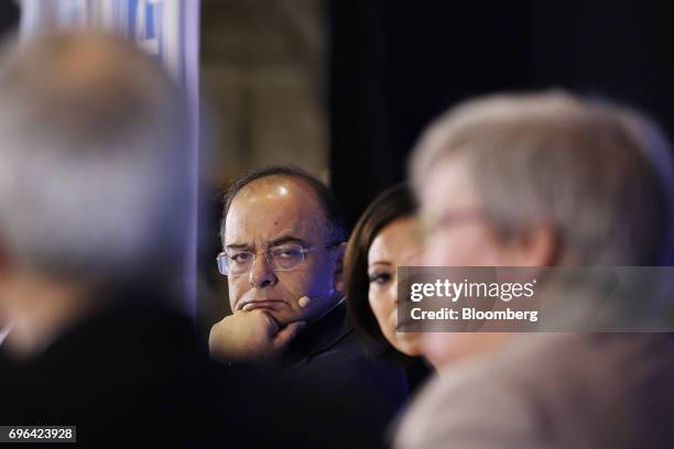 Arun Jaitley, India's finance minister, center left, attends a seminar at the Asian Infrastructure Investment Bank annual meeting in Jeju, South...