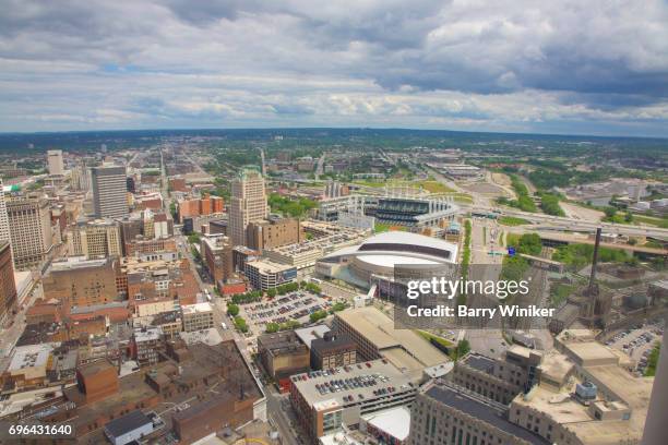 cleveland city view with baseball and basketball stadiums - cleveland street stock pictures, royalty-free photos & images