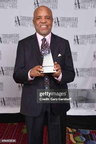 Inductee Berry Gordy poses with award backstage at the Songwriters Hall Of Fame 48th Annual Induction and Awards at New York Marriott Marquis Hotel...