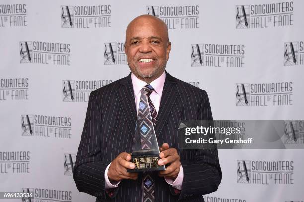 Inductee Berry Gordy poses with award backstage at the Songwriters Hall Of Fame 48th Annual Induction and Awards at New York Marriott Marquis Hotel...