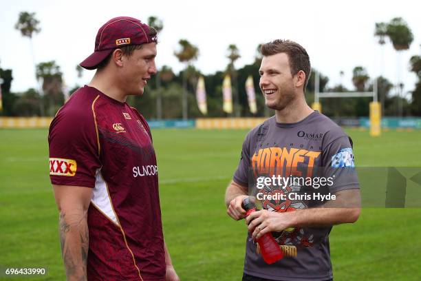 Boxer Jeff Horn talks with Jarrod Wallace during a visit to the Queensland Maroons State of Origin team during a training session at Intercontinental...