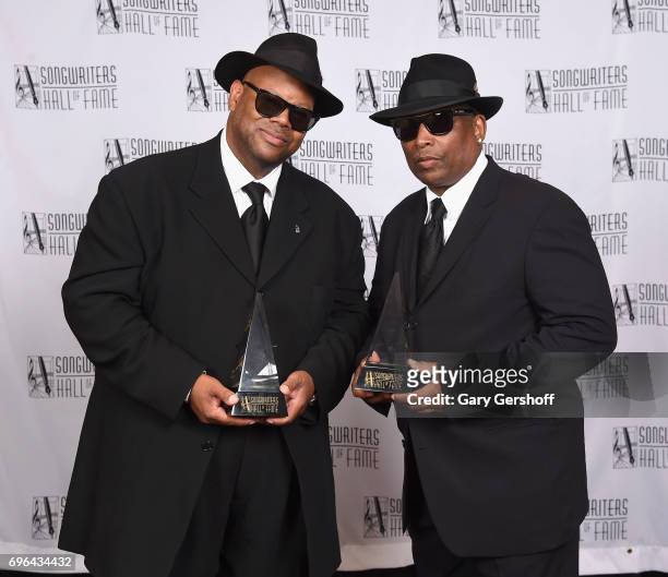 Inductees Jimmy Jam and Terry Lewis pose backstage at the Songwriters Hall Of Fame 48th Annual Induction and Awards at New York Marriott Marquis...