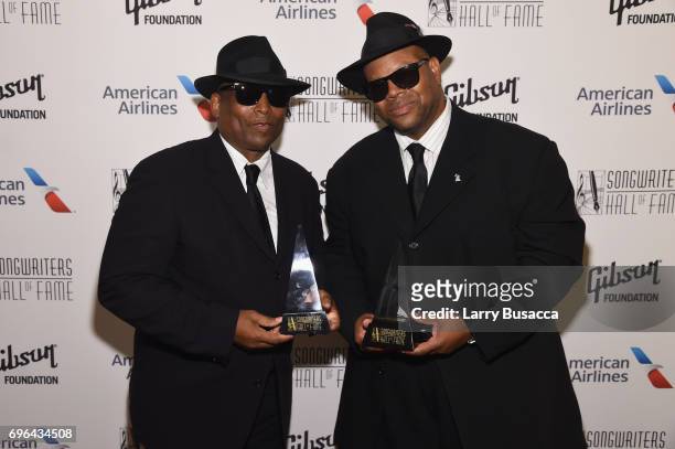 Inductees Terry Lewis and Jimmy Jam pose backstage at the Songwriters Hall Of Fame 48th Annual Induction and Awards at New York Marriott Marquis...