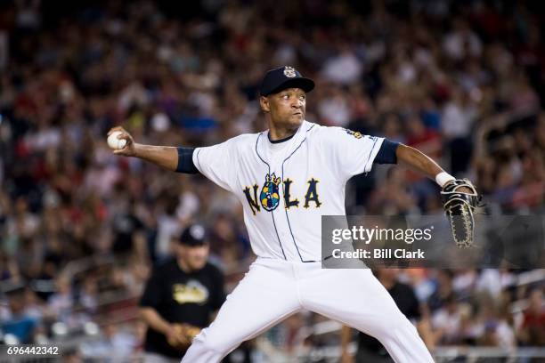 Rep. Cedric Richmond, D-La., pitches during the annual Congressional Baseball Game at Nationals Park in Washington on Thursday, June 15, 2017.