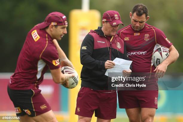 Coach Kevin Walters talks to Cameron Smith during a Queensland Maroons State of Origin training session at Intercontinental Sanctuary Cove Resort on...