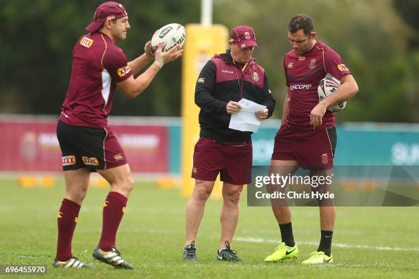 Coach Kevin Walters talks to Cameron Smith during a Queensland Maroons State of Origin training session at Intercontinental Sanctuary Cove Resort on...