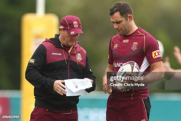 Coach Kevin Walters talks to Cameron Smith during a Queensland Maroons State of Origin training session at Intercontinental Sanctuary Cove Resort on...