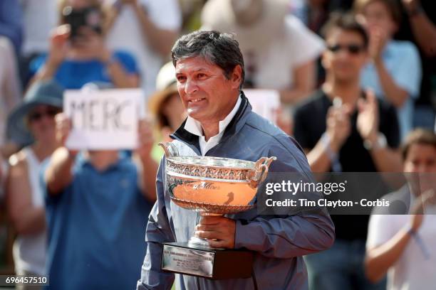 French Open Tennis Tournament - Day Fifteen. Uncle Toni Nadal brings out the trophy in honor of Rafael Nadal of Spain's tenth Round Garros Men's...