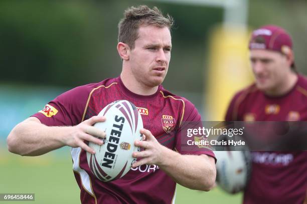 Michael Morgan passes during a Queensland Maroons State of Origin training session at Intercontinental Sanctuary Cove Resort on June 16, 2017 in...