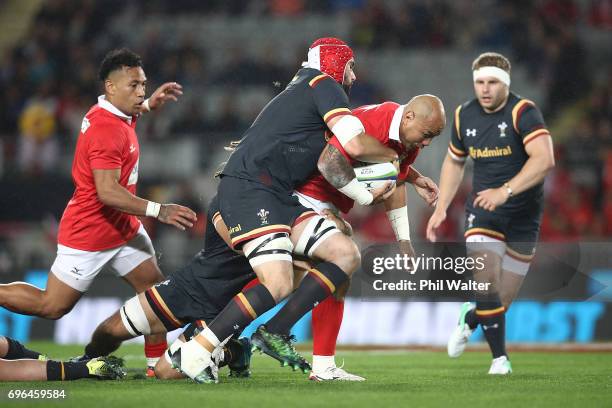 Nili Latu of Tonga is tackled during the International Test Match between Tonga and Wales at Eden Park on June 16, 2017 in Auckland, New Zealand.