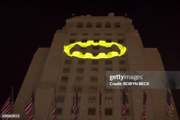 The Batman "Bat-signal" is projected onto Los Angeles City Hall in a tribute to the late actor Adam West, June 15 in Los Angeles, California. West,...