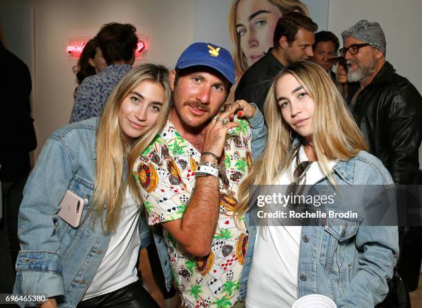 Artists Lexi Kaplan and Allie Kaplan , and photographer Mark Hunter attend the "Make Me Famous" exhibit hosted by The Kaplan Twins at De Re Gallery...