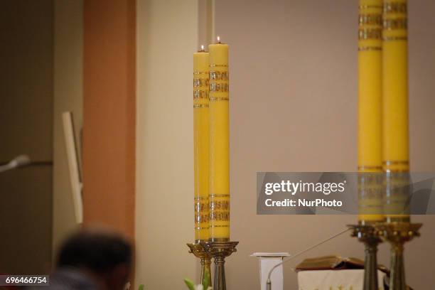 People are seen attending a mass on Corpus Christi day at the Vincent de Paul basilica on 15 June, 2017. Corpus Christi is a national holiday in...