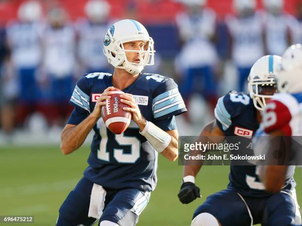 Ricky Ray of the Toronto Argonauts goes to throw a pass against the Montreal Alouettes during a CFL pre-season game at BMO field on June 8, 2017 in...