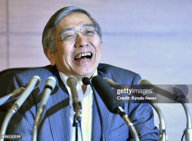 Bank of Japan Governor Haruhiko Kuroda holds a press conference at the BOJ's headquarters in Tokyo on June 16 following a decision by the central...