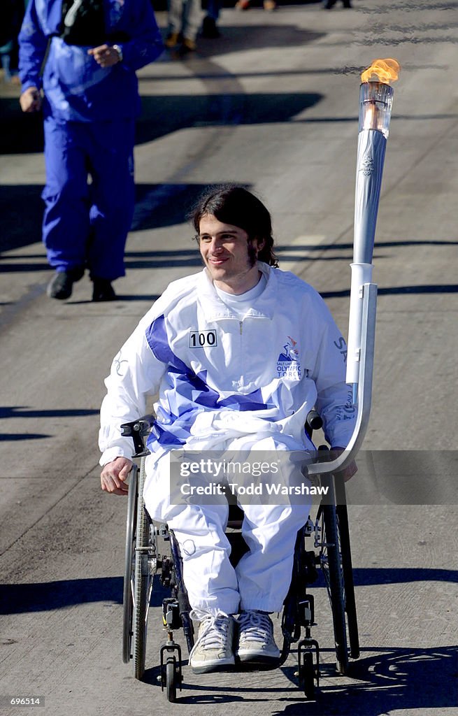 Columbine Principal And Student Carry Olympic Flame