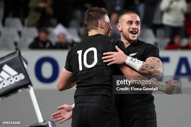 Perenara of the All Blacks celebrates a try with Beauden Barrett during the International Test match between the New Zealand All Blacks and Samoa at...