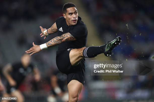 Aaron Smith of the All Blacks kicks ahead during the International Test match between the New Zealand All Blacks and Samoa at Eden Park on June 16,...