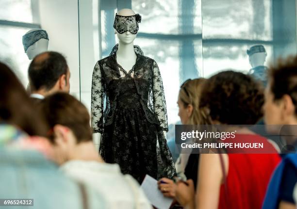 The 1966 black lace dress and lace mask, worn by Audrey Hepburn in the film "How to steal a million", designed by French fashion designer Hubert de...