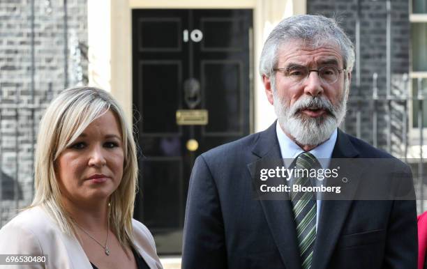 Michelle O'Neill, leader of Sinn Fin, left, speaks to the media while standing with Gerry Adams, president of the Sinn Fin, outside number 10 Downing...