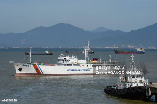 The Vietnam Coast Guard ship 6001 , which was a fishing boat handed over by the Japanese government, takes part in a joint training exercise with the...