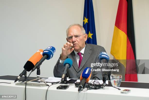 Wolfgang Schaeuble, Germany's finance minister, gestures while speaking during a news conference at an Ecofin meeting of European Union finance...