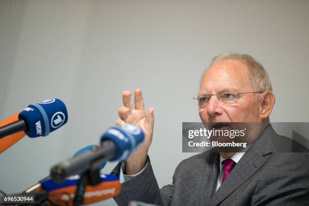 Wolfgang Schaeuble, Germany's finance minister, gestures while speaking during a news conference at an Ecofin meeting of European Union finance...