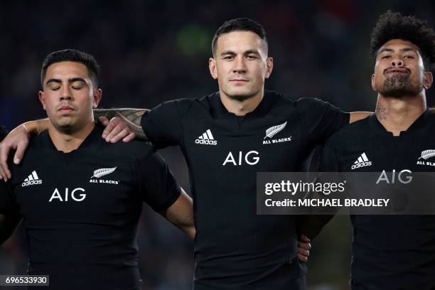 New Zealand's Sonny Bill Williams stands with teammates Anton Lienert-Brown and Ardie Savea before the international rugby test match between New...