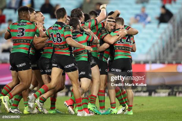 The Rabbitohs celebrate Bryson Goodwin scoring a try during the round 15 NRL match between the South Sydney Rabbitohs and the Gold Coast Titans at...
