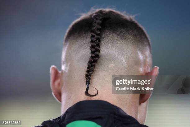 The hair of Tyrell Fuimaono of the Rabbitohs is seen during the round 15 NRL match between the South Sydney Rabbitohs and the Gold Coast Titans at...