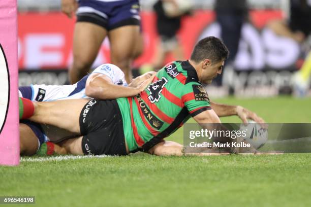 Bryson Goodwin of the Rabbitohs scoresa try during the round 15 NRL match between the South Sydney Rabbitohs and the Gold Coast Titans at ANZ Stadium...