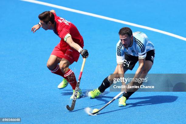 Manuel Brunet of Argentina shoots as Manjae Jung of South Korea attempts to block during the Pool A match between Korea and Argentina on day one of...