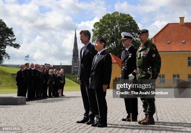 Crown Prince Naruhito of Japan and Crown Prince Frederik of Denmark offer a wreath at the Monument for Denmark's International Effort on June 16,...