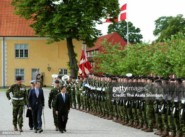 Crown Prince Naruhito of Japan and Crown Prince Frederik of Denmark visit the Monument for Denmark's International Effort on June 16, 2017 in...