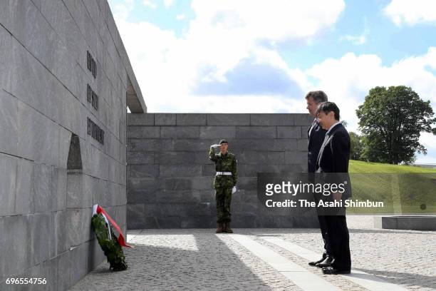 Crown Prince Naruhito of Japan and Crown Prince Frederik of Denmark offer a wreath at the Monument for Denmark's International Effort on June 16,...