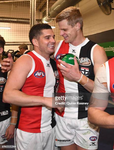 Leigh Montagna and Nick Riewoldt of the Saints celebrate in the rooms after winning the round 13 AFL match between the North Melbourne Kangaroos and...