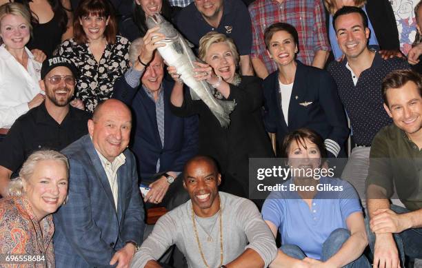 Hillary Clinton, Bill Clinton and Chelsea Clinton pose with the cast backstage at the hit musical "Come From Away" on Broadway at The Schoenfeld...