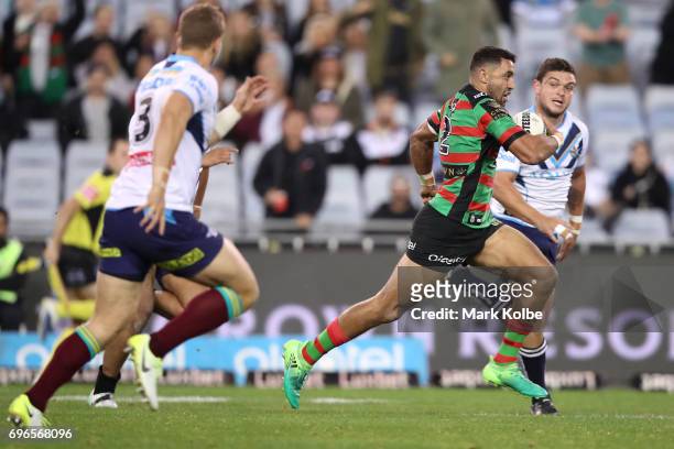 Alex Johnston of the Rabbitohs makesa break during the round 15 NRL match between the South Sydney Rabbitohs and the Gold Coast Titans at ANZ Stadium...