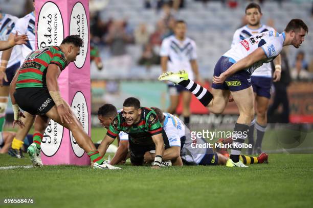 Cody Walker of the Rabbitohs celebrates scoring a try during the round 15 NRL match between the South Sydney Rabbitohs and the Gold Coast Titans at...